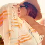 LUXI hand-dyed cotton textile worn over shoulder straw hat LOMYNA
