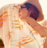 LUXI hand-dyed cotton textile worn over shoulder straw hat LOMYNA