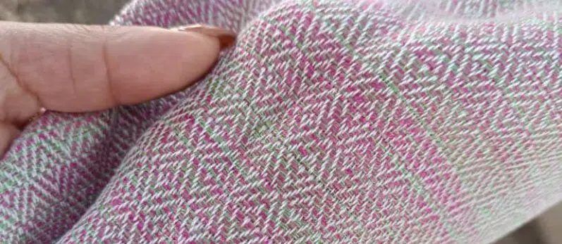 Close-up of the delicate Chevron & Diamond Weave of the LOVE Viscose Silk Wrap, revealing the exclusive 4-color blend and Hand-Woven softness for Artisan Luxury.
