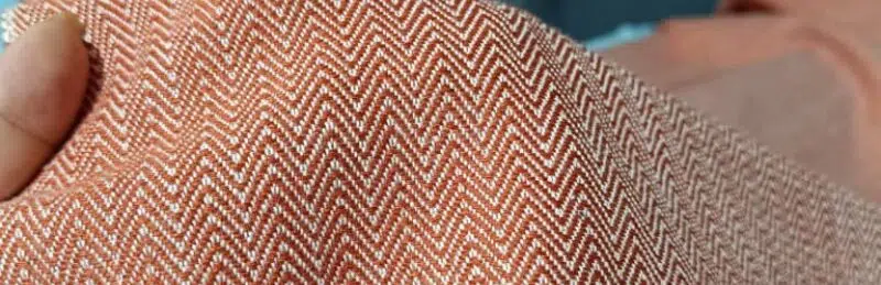 Close-up of LOVE Hand-Woven Viscose Silk Wrap Diamond Weave, showcasing a two-color, four-thread composition, emphasizing weaving expertise and LOMYNA's exclusive quality.