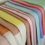Color variety of Lomyna LOVE towels arranged in multiple shades.