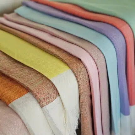 Color variety of Lomyna LOVE towels arranged in multiple shades.