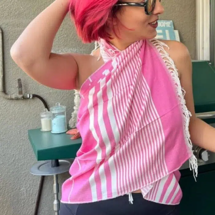 LOMY: Luxury Silky Viscose Travel Wrap in rose pink, styled elegantly around a woman's neck, showcasing the soft drape and generous 140x70 cm size